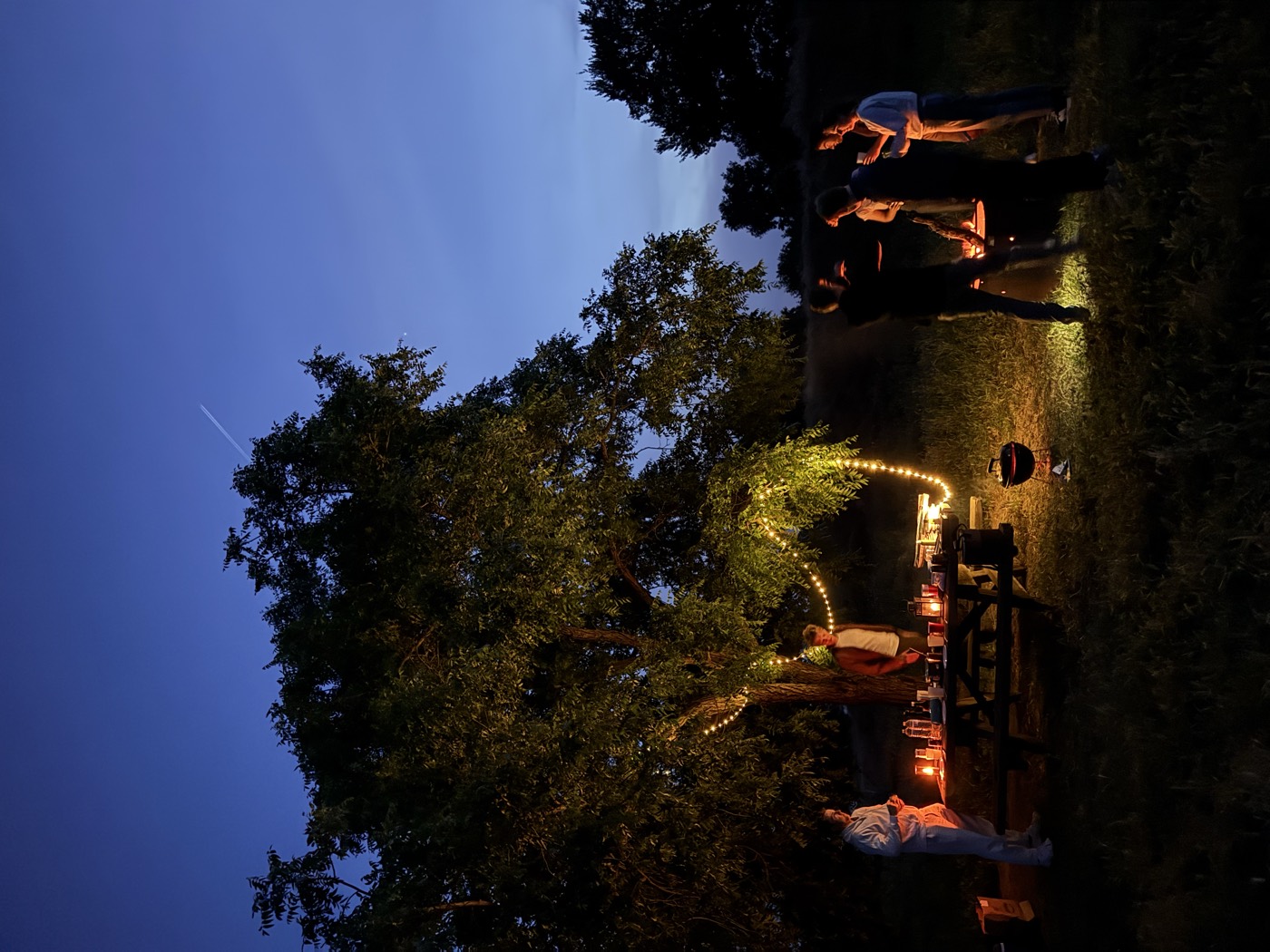 Cozy string lights at a campsite